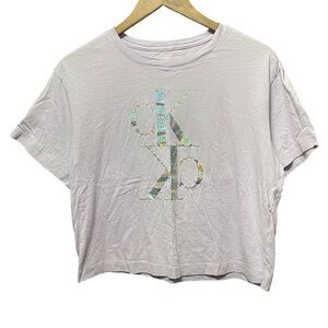 light purple Calvin Klein jeans metallic silver CK graphic logo cropped T-shirt